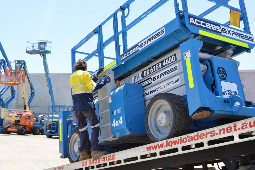 Access Express Genie Rough Terrain Scissor Lift Loading onto Tilt Tray in Canning Vale, WA